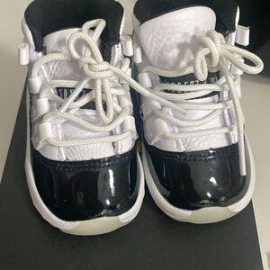 Black and white Jordan 11 worn three times size 4c